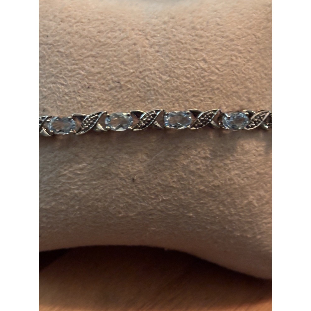 Sterling Silver And Blue Topaz Tennis Bracelet  7.25"